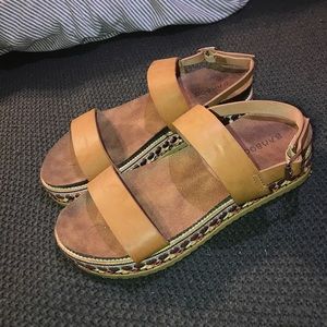 Brooklyn’s platform sandals